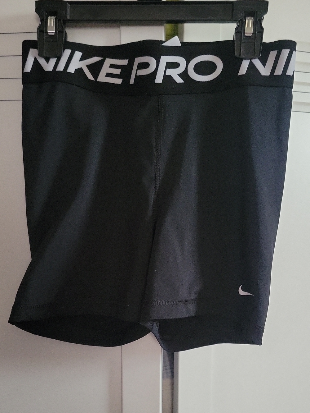 Nike Black Women's Athletic Compression Shorts with White Logo Waistband